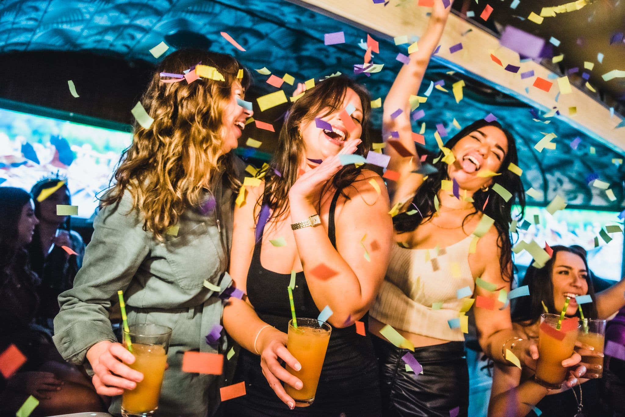 Three girls partying at Barrio Bars