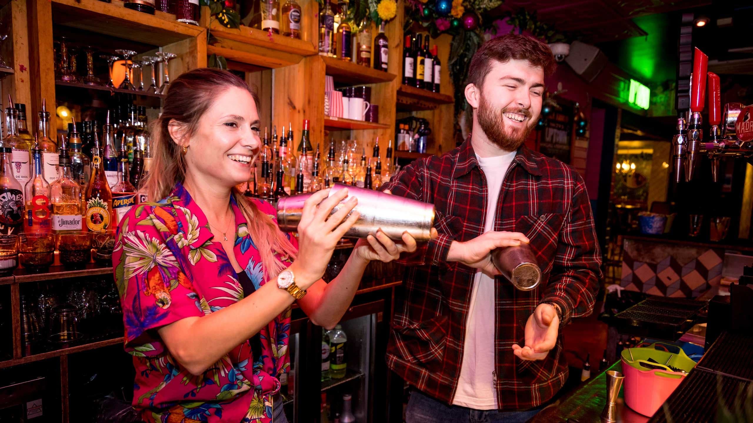 Customers enjoying a Cocktail Masterclass at Barrio Bars