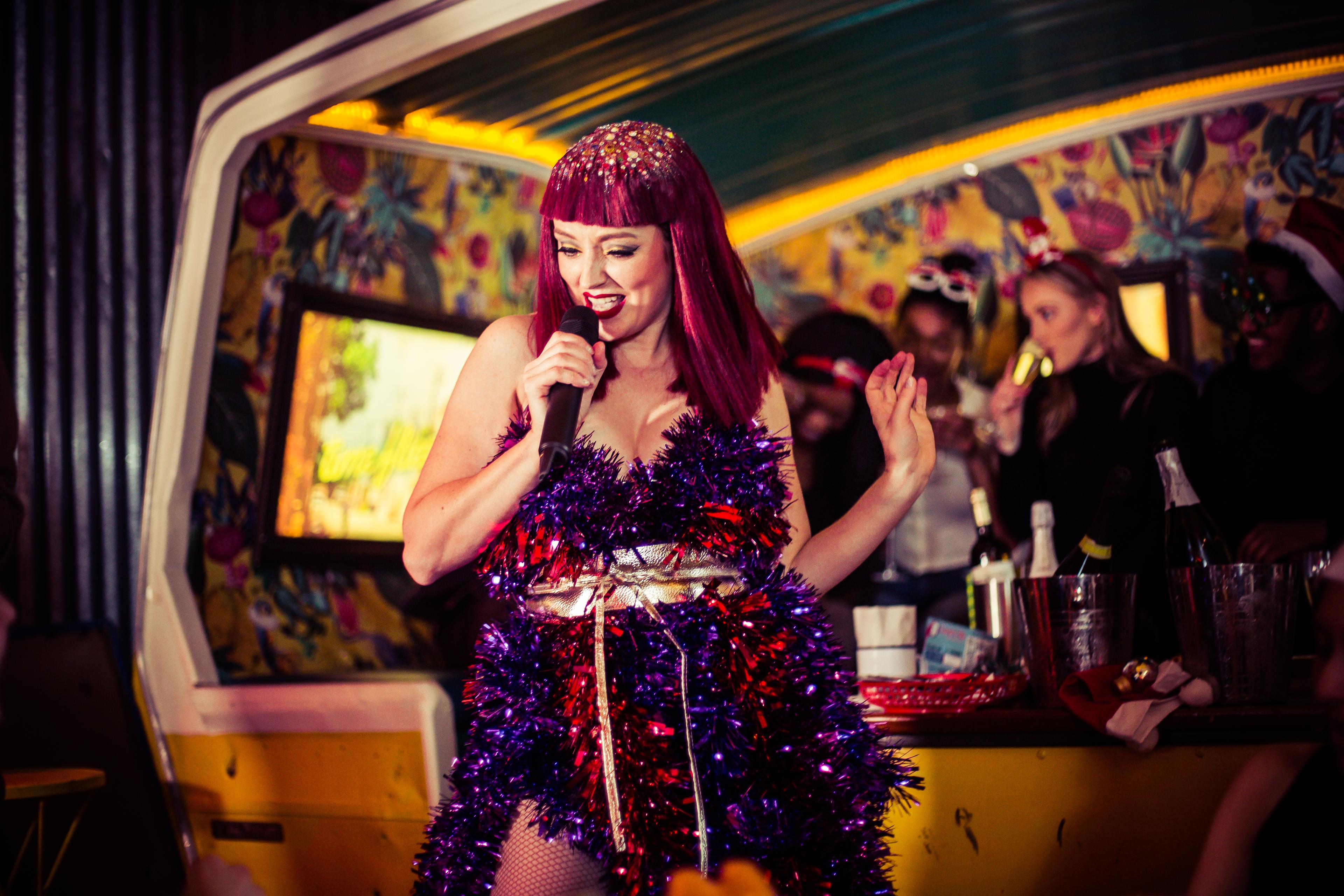 Christmas entertainer at barrio bars